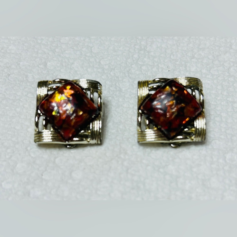 Vintage earrings, clip on. Possibly Coro. Amber Lucite, silver tone.1950’s.